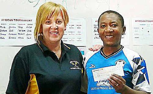 SUPPORT: Gympie Squash Courts’ owner Susan Kerr presents Pastor Francis Nyameche with a cheque to help alleviate poverty in Kibera, Africa. SUPPORT: Gympie Squash Courts’ owner Susan Kerr presents Pastor Francis Nyameche with a cheque to help alleviate poverty in Kibera, Africa.